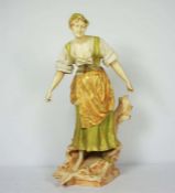 A large Royal Dux figure of a country lady, stamped to base indistinctly (possibly 9055), 62cm