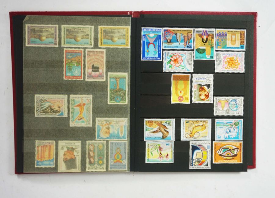 A small group of assorted stamps from Tunisia, including two presentation sets, many dated 1950-60’
