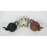 Two 19th century tea pots, including a large Victorian salt glaze example, impressed ‘a present from