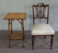 An Edwardian bamboo two tier plant stand or table, together with a single Edwardian salon chair,