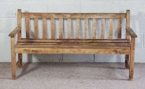 A modern garden bench, with slatted back, weatheredCondition reportApproximately 165cm x 57cm x 43cm