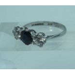 A three stone engagement ring, CZ type ‘diamond & sapphire’ brilliant cut claw set on white gold
