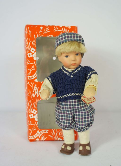 Lot of three Käthe Kruse dolls in boxed condition selling with one unboxed Helen Kish doll. These