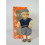 Lot of three Käthe Kruse dolls in boxed condition selling with one unboxed Helen Kish doll. These