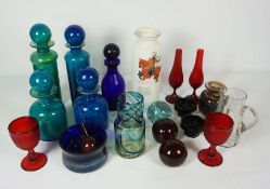 A mixed group of coloured glass, including a pair of ruby glass faceted goblets, assorted blue glass