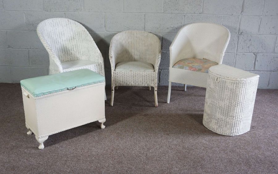 Three white bathroom chairs & two laundry baskets (5)