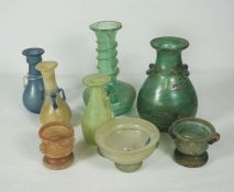 A large assortment of archaistic style glass, including Roman soda type glass vases, probably 20th
