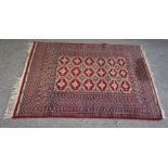 Three assorted rugs, including a small Tekke Turkoman, all 20th century (3)