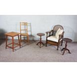 A cased bergere reclining chair; together with a pair of small occasional tables, another small
