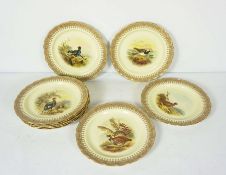 A set of nine Royal Worcester vitreous plates, hand painted with game birds, including Black and Red