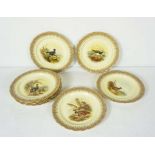 A set of nine Royal Worcester vitreous plates, hand painted with game birds, including Black and Red