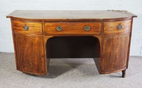 A George III mahogany bow-fronted sideboard, distressed condition, 164cm wide by 90cm high by 63.5cm