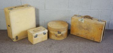 A vintage set of four calf suitcases, including a hat box and vanity case, all with chrome