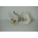 A pair of LLadro porcelain cockerels, 23cm high, together with assorted other decorative ceramics,