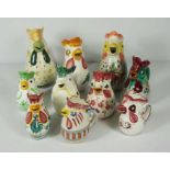 A large assortment of Italian Deruta Majolica pitcher jugs, all with assorted chicken head spouts,