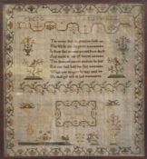 A Regency needlework sampler, signed by Sarah Clark and dated 1815, decorated with a verse flanked