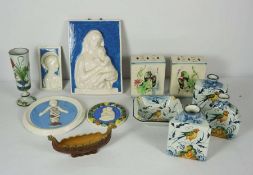 A collection of Italian majolica decorative wares, including a bird painted bottle vase, two