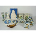 A collection of Italian majolica decorative wares, including a bird painted bottle vase, two