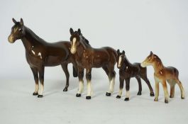 Two Beswick mares and their foals (one foal unsigned), tallest 14cm high (4)