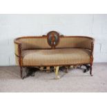 A late Victorian rosewood and marquetry settee, circa 1900, with rounded and enfolding back, pierced