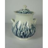 A large Victorian covered two handled soup tureen, with blue and white decoration with leaves and