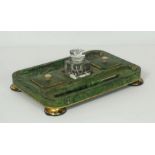A late Regency papier-mâché simulated malachite inkstand, 19th century, with two covered boxes and a