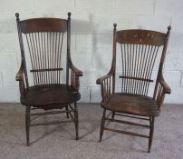 An unusual pair of spindle backed Windsor style armchairs, circa 1900, possibly American, with