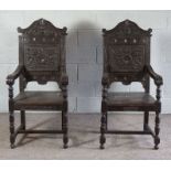A pair of 17th century Jacobean revival wainscot chairs, late 19th century, with panelled and carved