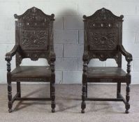 A pair of 17th century Jacobean revival wainscot chairs, late 19th century, with panelled and carved