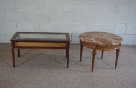 A glass topped vitrine coffee table, with tapered legs 46cm high, 89cm high, 45cm deep; together