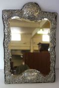 A Victorian silver framed looking glass, hallmarked Birmingham 1899, makers mark indistinct,  the