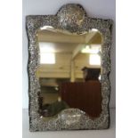 A Victorian silver framed looking glass, hallmarked Birmingham 1899, makers mark indistinct,  the