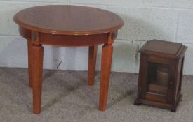 A tobacco jar and pipe cabinet, together with a small circular occasional table (2)