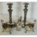 A pair of Victorian silver plated candlesticks, with embossed decoration, 29cm high; together with a