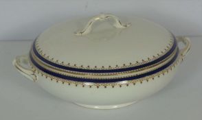 A Crown part dinner service, decorated with blue and gilt bands; comprising four covered vegetable