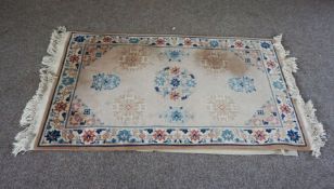 Four small modern decorative rugs (4)