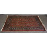 A fine and small Isfahan rug, with a central medallion, within floral borders, on a blue ground,