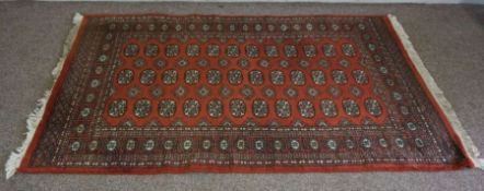 A fine and small Isfahan rug, with a central medallion, within floral borders, on a blue ground,