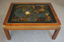 A large hardwood coffee table, inset with a facsimile early map of the world, after Nicolao