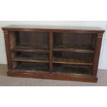 A George III style mahogany open bookcase, late 19th century, with adjustable shelves in two