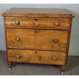 A small Victorian Dutch style walnut veneered chest of drawers, with a concave moulded top drawer