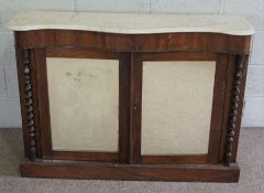 A Victorian rosewood and marble topped side cabinet, circa 1870, with a serpentine top over two