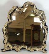 A large Victorian silver mounted looking glass, hallmarked London 1901,  the baroque style frame