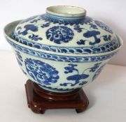 A Chinese blue and white porcelain bowl and saucer, Qianlong, marked and possibly of the period,