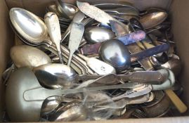 A large quantity of silver plated flatware and related items, including a ladle, fiddle pattern