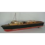 A scale model of a motor boat, cicra 1960, with wooden decks and painted sides