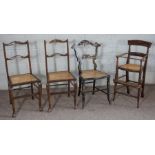 A Victorian simulated rosewood childs high chair, with a caned seat; together with three other caned