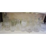 A collection of assorted cut glass decanters, assorted related bowls, jugs etc, one decanters with a