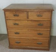 An Edwardian chest of drawers, with two short and three long drawers, 100cm high, 100cm wide