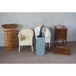 An Edwardian bedside cabinet; together with two Lloyd Loom style bathroom chairs, two wine racks,